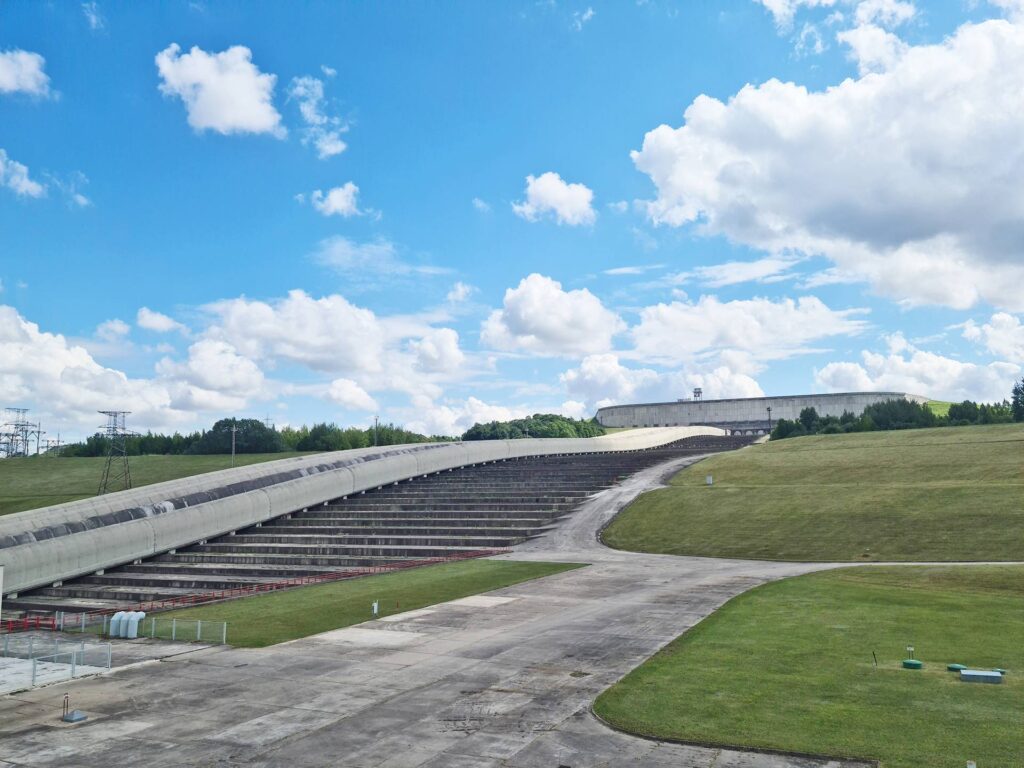 When there is a surplus of electricity, water is pumped from the lower basin to the upper basin.