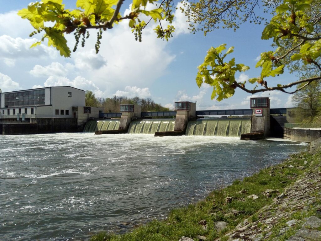 Underwater view of the Offingen power station on the Danube, with overflowed weir gate.