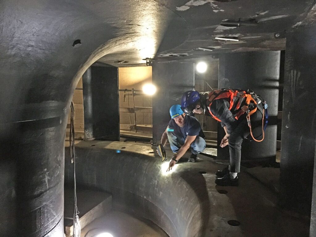 Inspecting the rotor blades and water level plate.